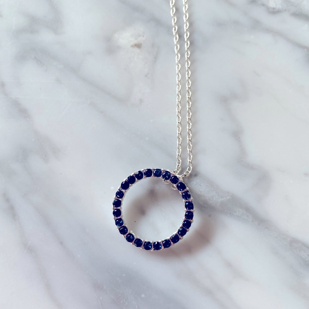 Blue circle pendant necklace.